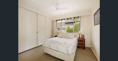 A quiet tree-lined street situated in an excellent location - Photo 2