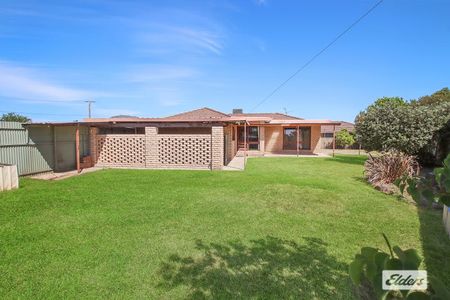 Charming 4-Bed, 2-Bath Home with Modern Upgrades & Spacious Backyard - Photo 2