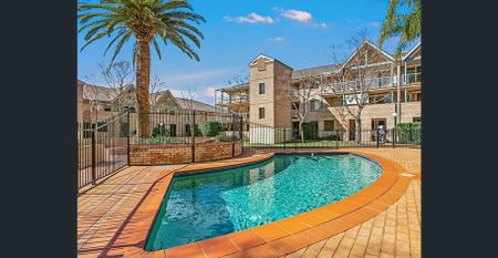 Stylish Two-Bedroom Urban Retreat in a Prime Parramatta Location - Photo 2