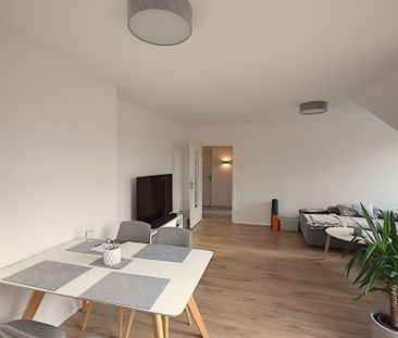 Moderne & helle 2 Zimmer DG-Wohnung mit Loggia - Foto 1