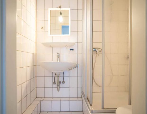 Nettes Dachgeschoss-Appartement mit Einbauküche und Aufzug in ruhiger Lage - Foto 1