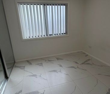 Modern 4-Bedroom Home Offering Style & Convenience - Photo 4