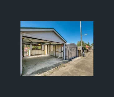 Spacious Two-Bedroom with Sunroom in a Quiet Tree-Lined Street! - Photo 6