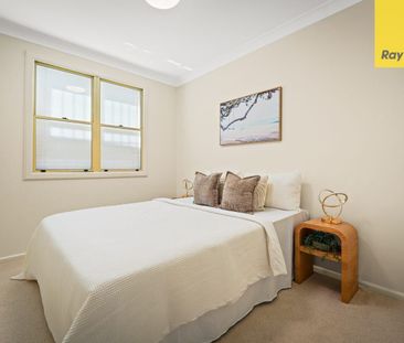 STYLISH BRICK HOME WITH SPACE, COMFORT & LOCATION - Photo 1