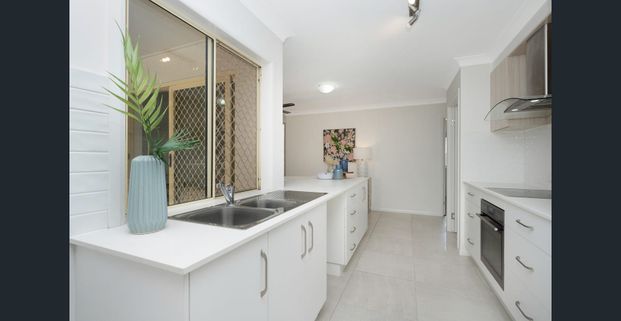 Resort-Style Living in Idalia - Three-Bed Home with Sparkling Pool! - Photo 1