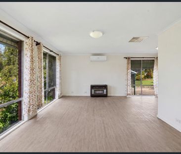 Comfortable Three-Bedroom Home with Gardens and Outdoor Entertaining - Photo 1