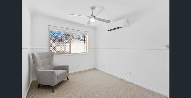 MODERN RENOVATED GEM WITH POOL AND FLEXIBLE LIVING SPACES - Photo 1