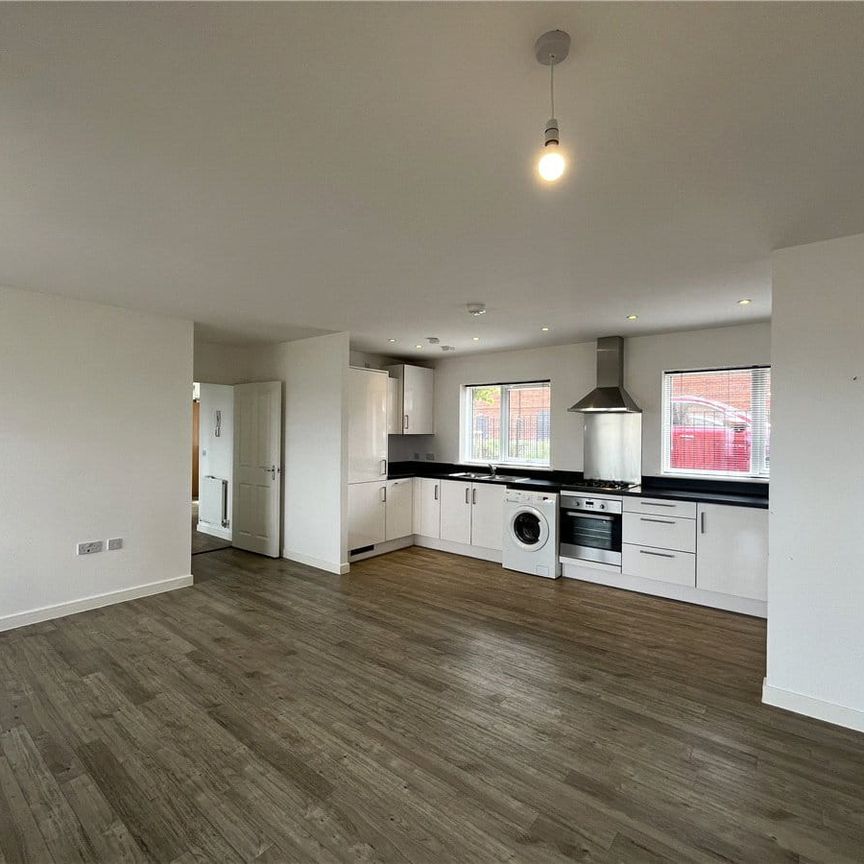 Modern two bedroom/two bathroom ground floor apartment with open plan kitchen/living area. - Photo 1