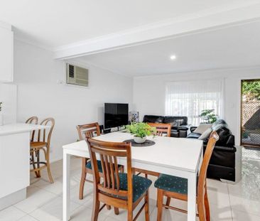 Fully-Renovated, Stylish Two Bedroom Townhouse in a Prime Location! - Photo 4