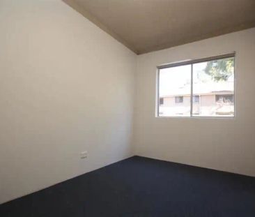“Convenient & Well-Presented Two-Bedroom Unit in Prime Location” - Photo 2