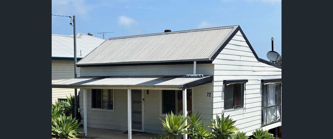 CHARMING TWO-BEDROOM COTTAGE IN THE HEART OF CHARLESTOWN - Photo 1