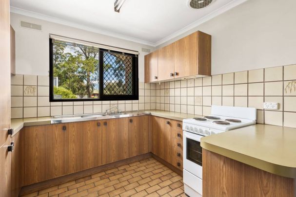 WELL PRESENTED | TWO-BEDROOM UNIT | AIR CONDITIONED - Photo 1