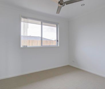 Modern and Well-Maintained Family Home in Prime Pimpama Location - Photo 4