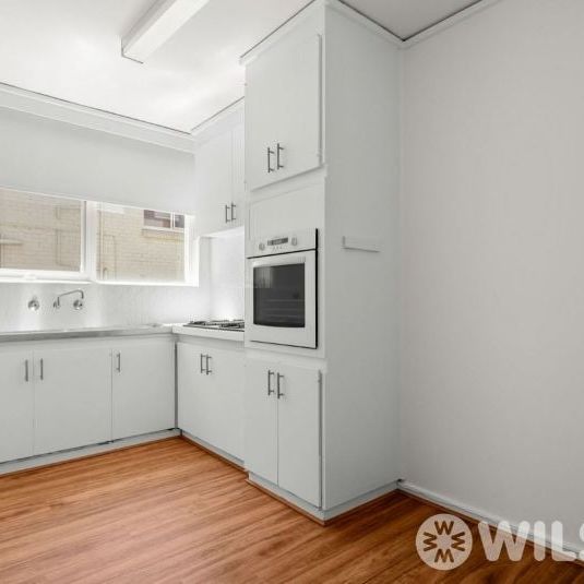 Large light filled unit in the perfect location - Photo 1