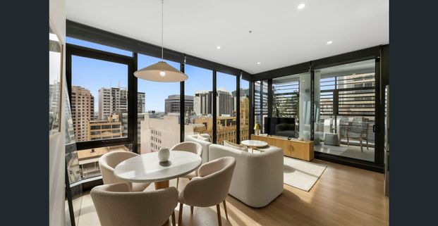 WHERE CONVENIENCE MEETS STYLE - FURNISHED ONE BEDROOM APARTMENT - Photo 1