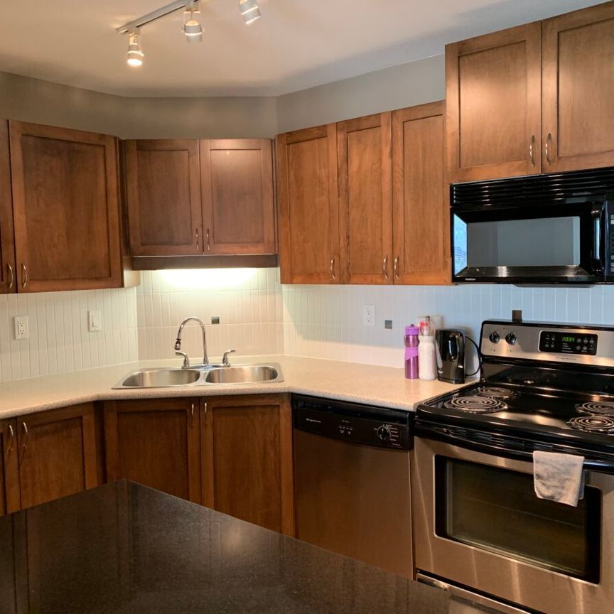 Central Uptown 2 Bed Condo - Photo 1