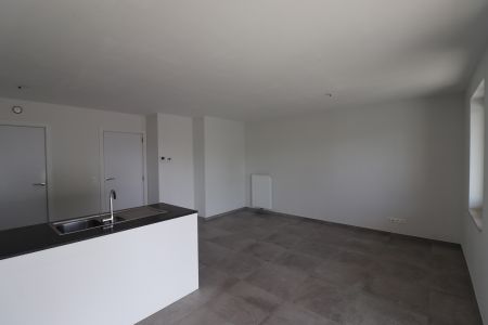 Prachtig appartement van 76m² op de 1ste verdieping rechts met terras en ondergrondse parkeerplaats. - Photo 4