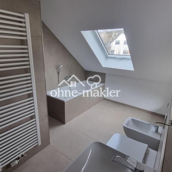 Erstbezug 3,5-Zimmer Dachgeschosswohnung mit wunderschöner Aussicht - Foto 1