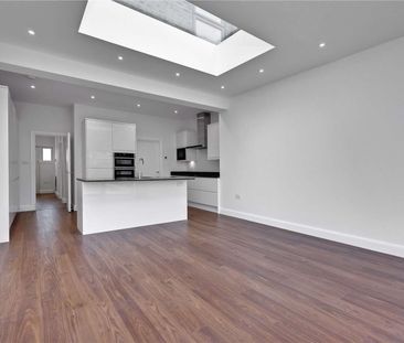 A refurbished four-bedroom family home in excellent proximity to lo... - Photo 1