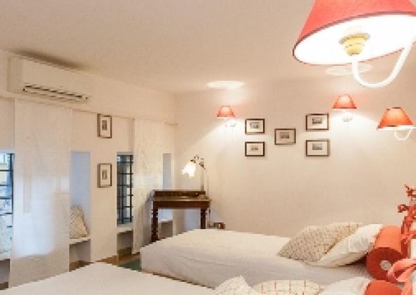 Center-Historic Jewish Quarter: Elegant apartment situated in beautiful Palazzo Nobiliare. Entrance, spacious living with original wood frescoed ceilings, large modern dining and kitchen, 4 bedrooms, 4 Baths, small terrace. #1527