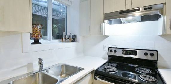 MODERN and very spacious 2 bedroom suite - utilities included! - Photo 2