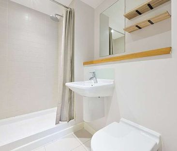 Stunning 2-bedroom apartment located on the upper floor of this dev... - Photo 4