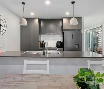 “Private, Low-Maintenance Living Just Steps from Bumblebee Park” - Photo 3