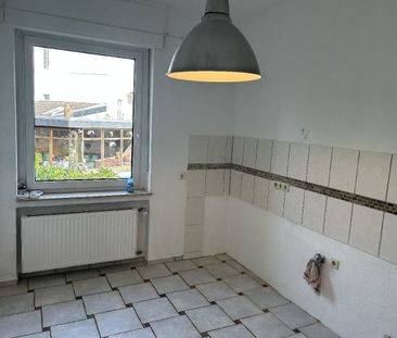 Charmante Altbauwohnung mit Wintergarten, Terrasse und Gartenfläche in Leverkusen-Manfort! - Photo 1