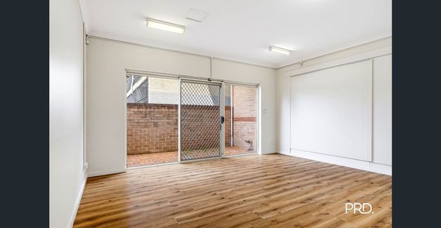 Spacious One-Bedroom Unit with Double Garage and Ample Storage - Photo 1