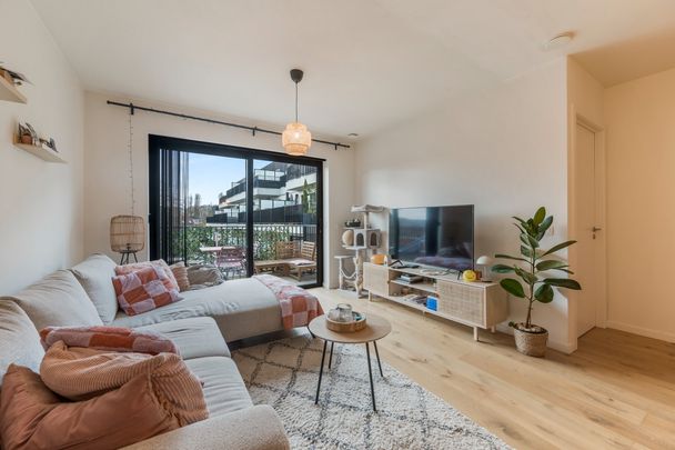 Nieuwbouwappartement met zonnig terras in hartje Steendorp - Photo 1