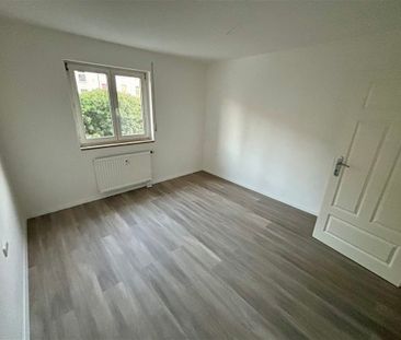 Komplett Renoviert ! Hübsche 2 Zi.-Whg. mit Balkon, AR und TG-Stell... - Foto 1