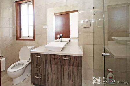 Sitting Amongst the Flowers - Photo 2