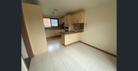 REFRESHED THREE BEDROOM TOWNHOUSE - Photo 2