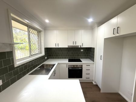 Freshly Renovated 2 Bedroom Unit! - Photo 4