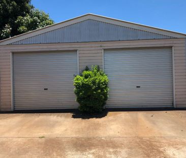 Charming 2 Bedroom Home with Bonus Studio & Double Lock Up Garage! - Photo 5