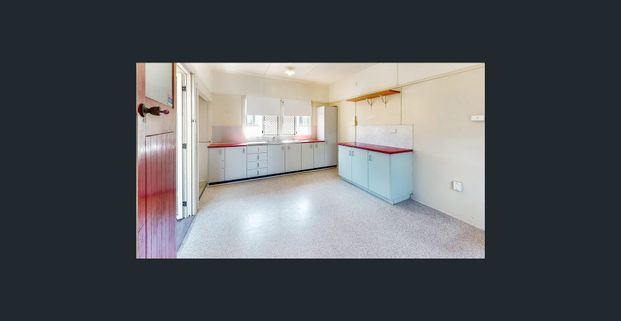 Elevated Home in Great Location! - Photo 1