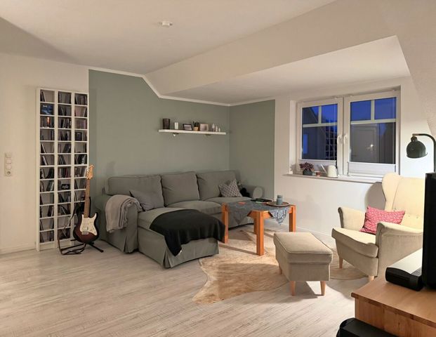 Gemütliche Dachgeschosswohnung mit Balkon in ruhiger und dennoch zentraler Lage der Stadt Aurich - Foto 1