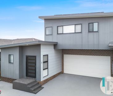 East Side Location – Modern Townhouse - Photo 1
