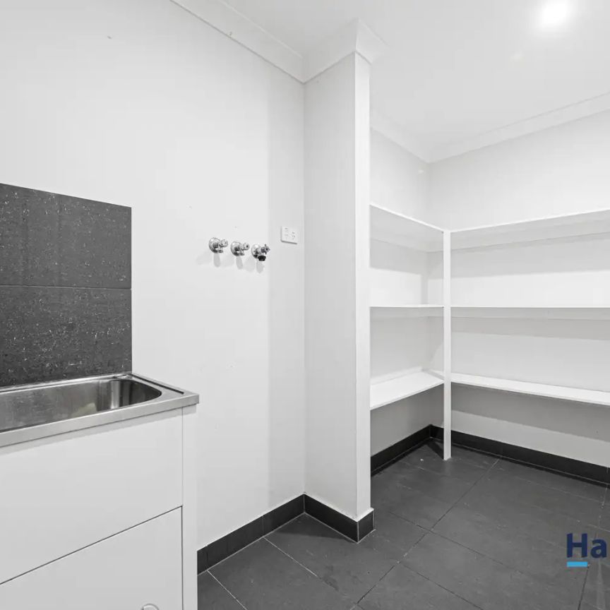 “Modern Family Residence Offering Comforts and Low-Maintenance Living” - Photo 1