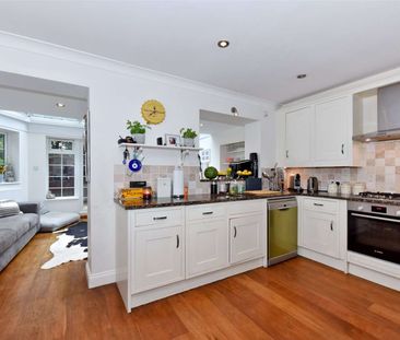 A well presented four bedroom townhouse situated in the heart of Cobham Town centre. - Photo 6