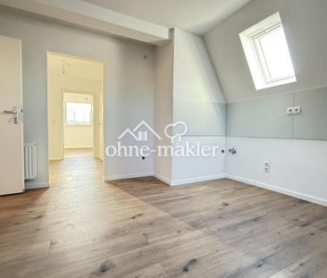 Moderne 1,5 Zi-Dachgeschosswohnung in einer Stadtvilla - Foto 1