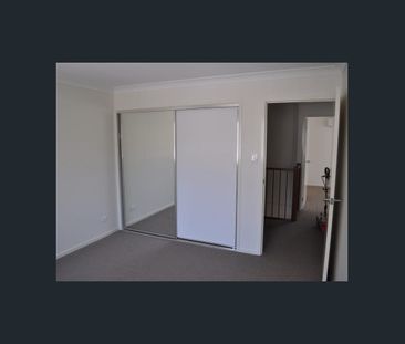 3 Level townhouse with large tandem garage - Photo 4