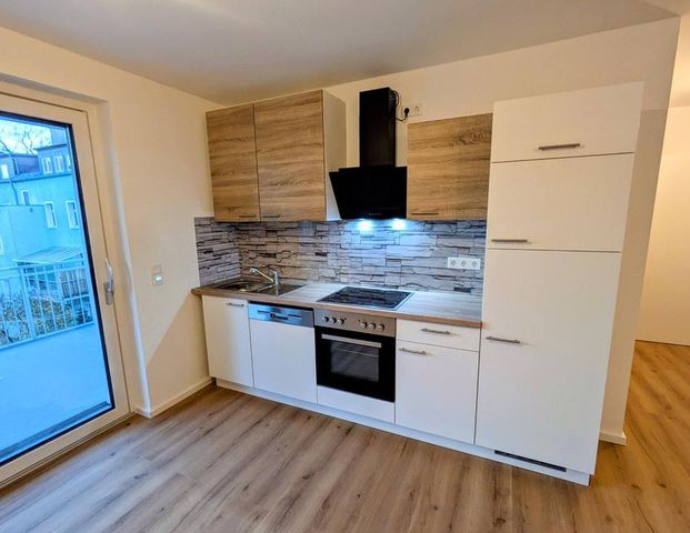 Erstbezug: Hochwertige 2-Zimmer-Wohnung mit großem Balkon - Foto 1