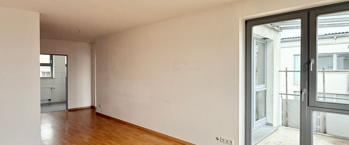 Helle 3-Zimmer-Wohnung mit guter Aufteilung & Balkon - Foto 1