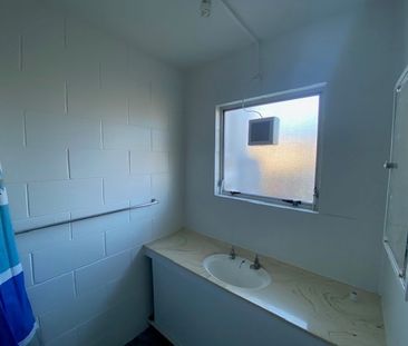 This well-presented two-bedroom unit is ideally located in the soug... - Photo 2