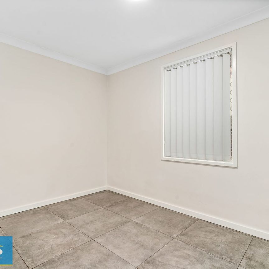 Beautiful 3 Bedroom Family Home. Quiet, convenient location. Air Conditioning. Large covered outdoor patio overlooking private backyard. - Photo 1