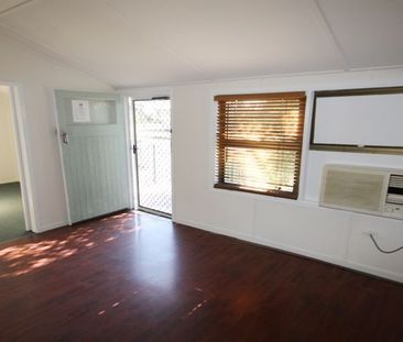 Conveniently located high-set 4 bedroom home. - Photo 2