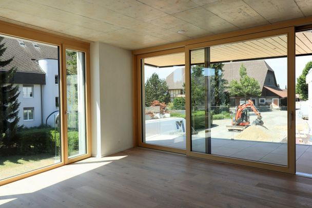 Moderne 4.5-Zimmer-Erdgeschosswohnung mit Gartensitzplatz - Foto 1