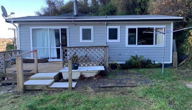 Charming 2BR Home with Deck & Shed! - Photo 1