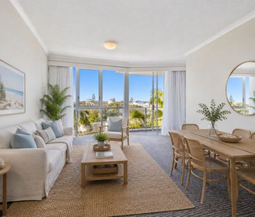 Low-maintenance living in a central location. - Photo 2